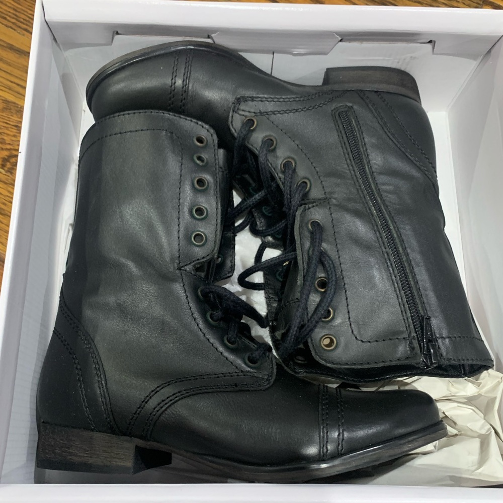 Brand New! Steve Madden black Troopa boots. Never worn.